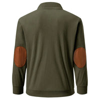 Olivgrüne Herrenjacke mit braunen Ellbogen-Patches, geripptes Material, modisch und bequem.