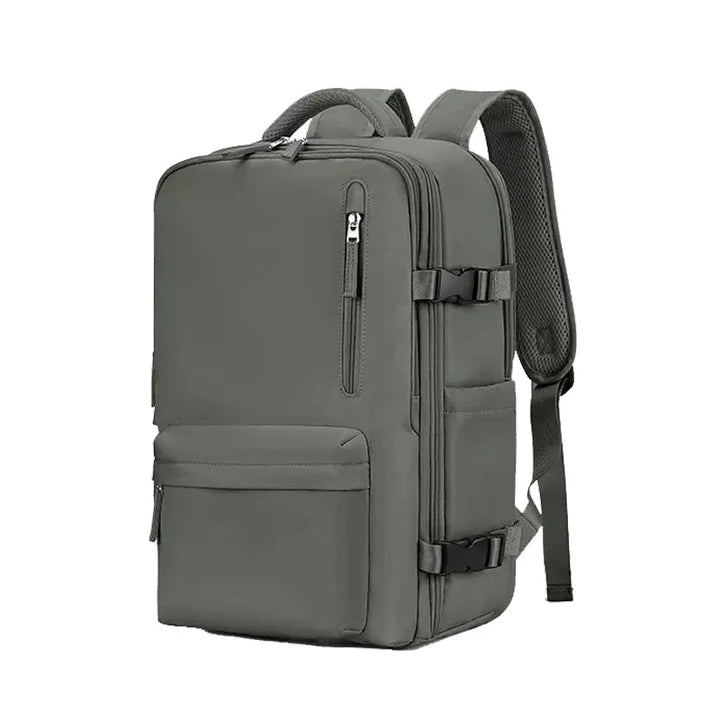 Grüner Rucksack, wasserdicht, mit mehreren Fächern, ideal für Reisen und Alltag.