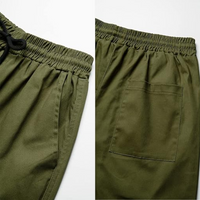 Grüne Jogginghose aus Baumwolle mit elastischem Bund und Tasche, Herrenmode, Freizeitkleidung.