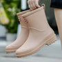 Beige Gummistiefel für Damen, wasserdicht, rutschfest, ideal für Regenwetter.