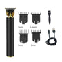 Elektrischer Haarschneider Set, schwarz-gold, mit Aufsätzen, USB-Kabel, Reinigungsbürste.