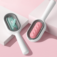 Handstaubsauger in Weiß und Rosa, tragbar, kabellos, für Tierhaare und Krümel, modernes Design.