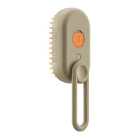 Beige Silikon-Hundebürste mit orangefarbenen Borsten und ergonomischem Griff für Fellpflege.