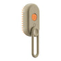 Beige Silikon-Hundebürste mit orangefarbenen Borsten und ergonomischem Griff für Fellpflege.