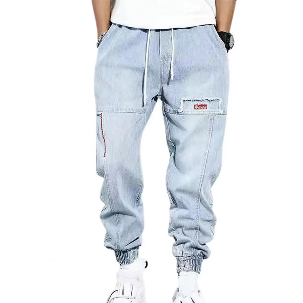 Harem-Hosen Herren, hellblau, Jeansstoff, elastische Bündchen, Taschen, lässig, modisch.