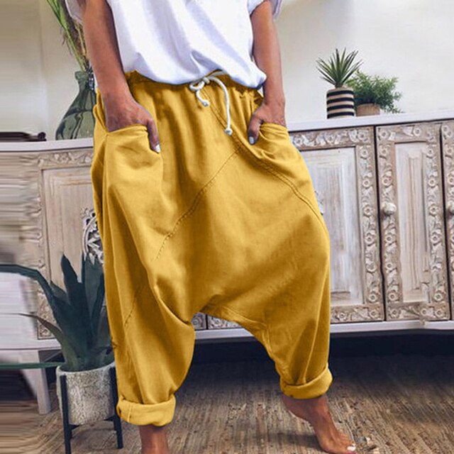 Gelbe Damen-Haremshose, locker geschnitten, Boho-Stil, mittlere Taille, Freizeitmode.
