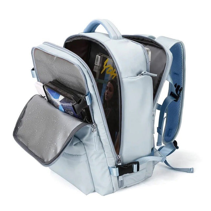 Hellblauer Rucksack mit mehreren Fächern, wasserdicht, ideal für Schule oder Reisen.