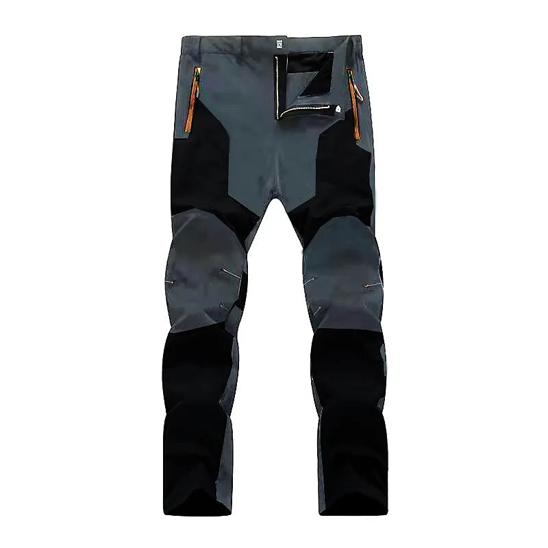 Graue Outdoor-Hose, wasserdicht, mit Reißverschlusstaschen, ideal für Wandern und Trekking.