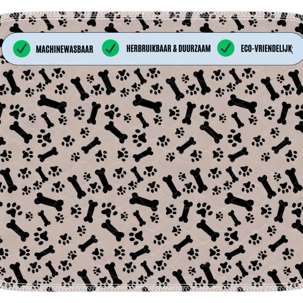 Beige Hundedecke mit schwarzen Knochen- und Pfotenabdrücken, maschinenwaschbar, umweltfreundlich.