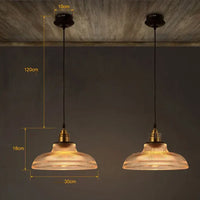 Zwei industrielle Pendelleuchten aus Glas, 30 cm Durchmesser, 120 cm Kabel, warmes Licht.