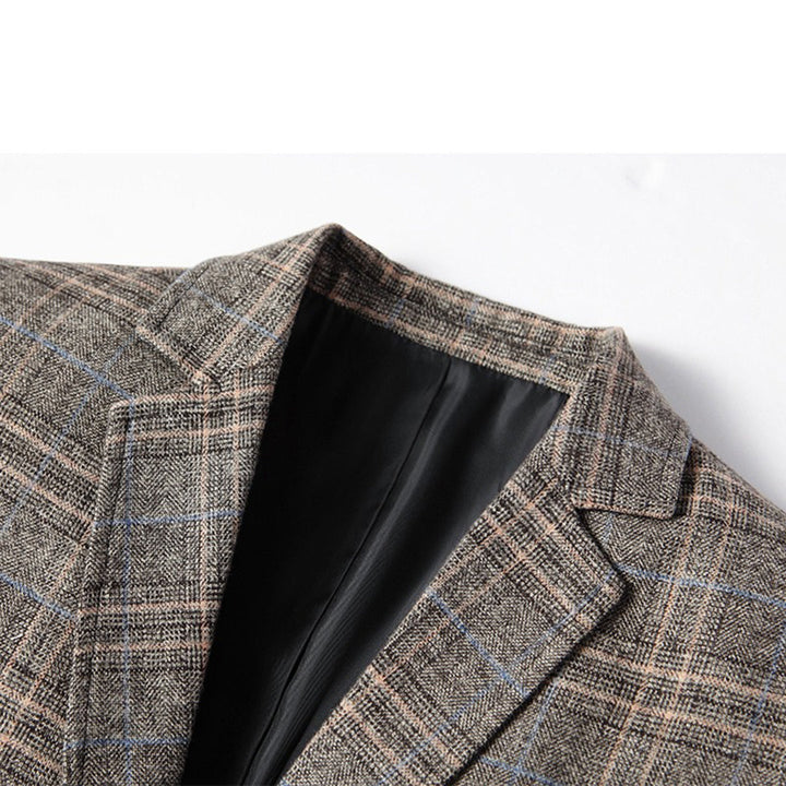 Graues kariertes Sakko aus Wolle, Herrenmode, elegantes Design, Nahaufnahme, klassischer Stil.