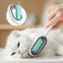 Katzenbürste mit ergonomischem Griff, weiß, für sanfte Fellpflege bei Katzen.