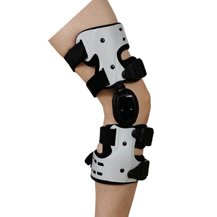 Orthopädische Knieorthese, weiß, verstellbar, für Stabilität und Unterstützung bei Verletzungen.