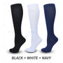 Drei Paar Kniestrümpfe in Schwarz, Weiß und Marineblau, nahtlos, unisex, Baumwolle.