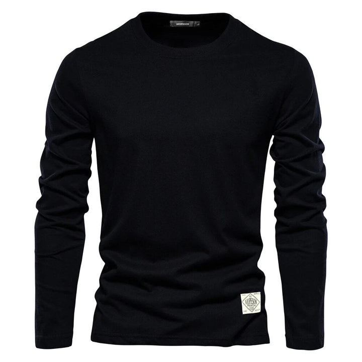 Schwarzes Langarmshirt für Herren, Baumwolle, Rundhalsausschnitt, modisch, bequem.