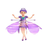 Lila fliegende Feenpuppe mit Flügeln, Spielzeug für Kinder, magische Fee, Geschenkidee.