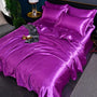 Lila Satin-Bettwäsche-Set, luxuriös, glänzend, vierteilig, Schlafzimmer-Dekoration.