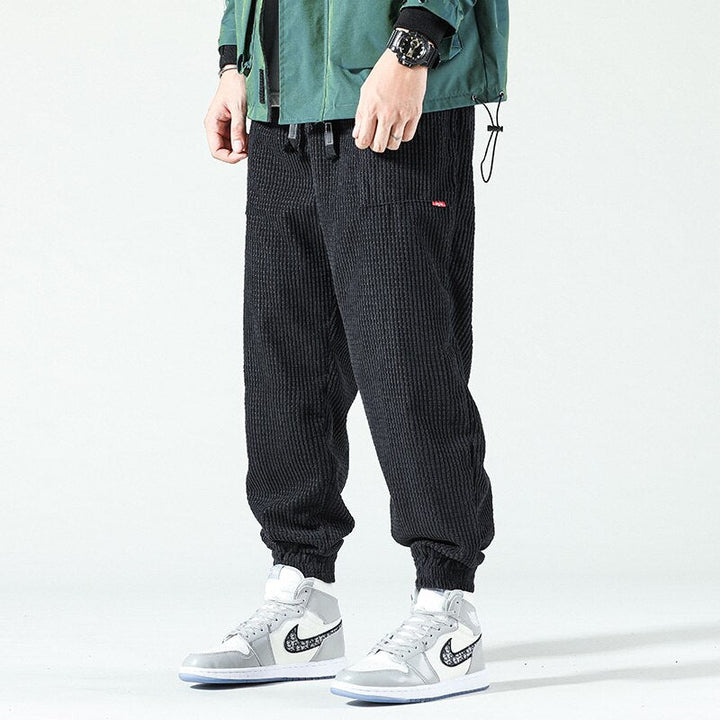 Schwarze Cordhose Herren, locker, gestreift, Hip-Hop-Stil, Herbst/Winter, Freizeitmode.