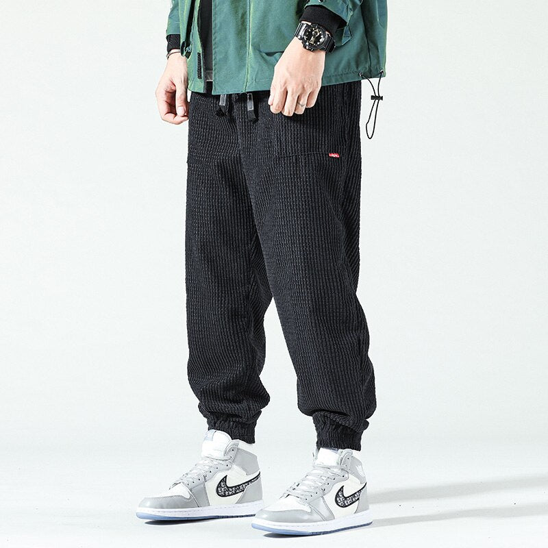Schwarze Cordhose Herren, locker, gestreift, Hip-Hop-Stil, Herbst/Winter, Freizeitmode.