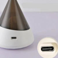Kegelförmiger Luftbefeuchter, USB-Anschluss, weiß, modern, tragbar, für Zuhause oder Büro.