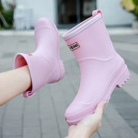 Rosa Kinder-Gummistiefel, wasserdicht, rutschfest, Outdoor-Spiel, langlebig, bequem.