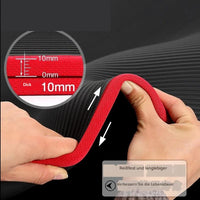 Schwarze Yogamatte 10mm dick, rutschfest, langlebig, mit rotem Rand, ideal für Fitnessübungen.