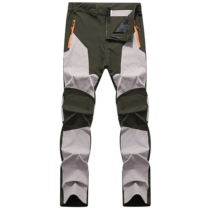 Wasserdichte Outdoor-Hose, grün-grau, mit Reißverschlusstaschen, ideal für Wandern und Trekking.