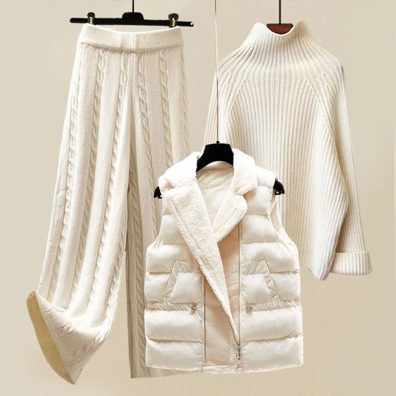 Weiße Damen Wintermode: Strickpullover, Steppweste, Strickhose, elegant und warm.